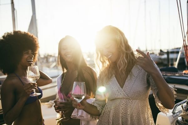 Three lovely friends waiting to board their hens party cruise