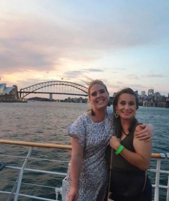 Two hens on the deck of a harbour cruise at sunset, from Dannielle's own photos